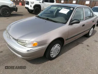 1998 Chevrolet Prizm Lsi z VIN 1Y1SK5285WZ438757, wystawiony jako IAAI lot #41896020 z przebiegiem 106 369 mil mil oraz . Historia ofert i sprzedaży dostępna na DreamBid. Obrazek 6.