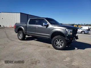 2016 Ford F-150 XLT with VIN 1FTEW1EF2GFA19213, listed as a Copart auction lot 49308655 with 122,838 mi miles and Salvage Title. Bid and sale history available at DreamBid. Image 14.