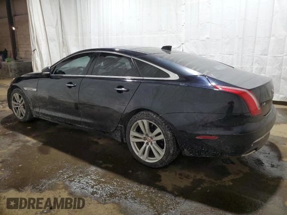 2016 Jaguar XJ with VIN SAJXJ1GD2G8V98776, listed as a Copart auction lot 41959995 with 77,391 mi miles and Salvage title. Bid and sale history available at DreamBid. Image 2.