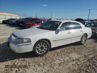 2009 Lincoln Town Car Signature Limited z VIN 2LNHM82V49X627650, wystawiony jako Copart lot #72061774 z przebiegiem 243 907 mil mil oraz Czysty tytuł • Clean title. Historia ofert i sprzedaży dostępna na DreamBid. Obrazek 1.