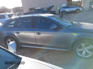 2014 Audi allroad Premium with VIN WA1TFAFL2EA068850, listed as a IAAI auction lot 41640053 with 168,660 mi miles. Bid and sale history available at carsss.com. Image 13.