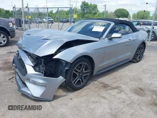 2020 Ford Mustang EcoBoost z VIN 1FATP8UH6L5106537, wystawiony jako IAAI lot #42518474 z przebiegiem 86 971 mil mil oraz . Historia ofert i sprzedaży dostępna na DreamBid. Obrazek 2.