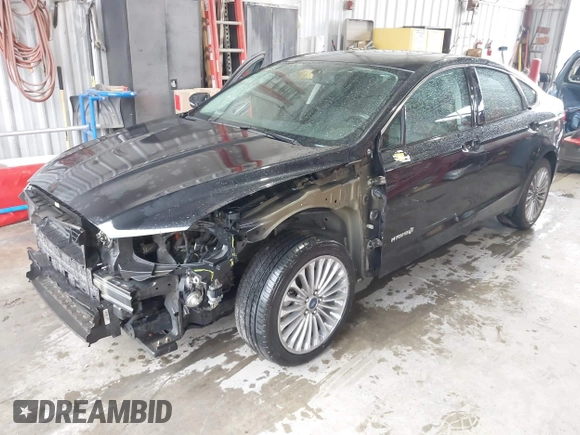 2013 Ford Fusion Titanium Hybrid with VIN 3FA6P0RU4DR281789, listed as a IAAI auction lot 41909115 with 161,008 mi miles and . Bid and sale history available at DreamBid. Image 2.