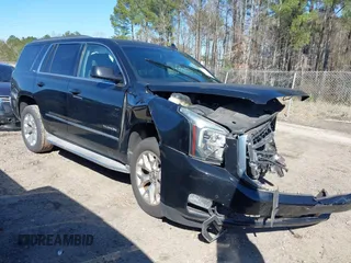 2015 GMC Yukon SLE with VIN 1GKS2AKC4FR720667, listed as a IAAI auction lot 41822277 with 134,984 mi miles and . Bid and sale history available at DreamBid. Image 1.