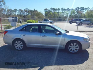 2009 Lincoln MKZ with VIN 3LNHM26T49R603563, listed as a IAAI auction lot 41822110 with 140,504 mi miles and . Bid and sale history available at DreamBid. Image 13.