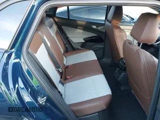 2023 Volkswagen ID.4 Pro z VIN 1V2DNPE81PC017620, wystawiony jako IAAI lot #41573053 z przebiegiem 15 462 mil mil oraz . Historia ofert i sprzedaży dostępna na DreamBid. Obrazek 8.