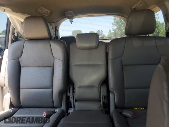 2014 Honda Odyssey EX-L z VIN 5FNRL5H66EB045019, wystawiony jako Copart lot #62899125 z przebiegiem 179 298 mil mil oraz Szkoda całkowita • Salvage title. Historia ofert i sprzedaży dostępna na DreamBid. Obrazek 10.