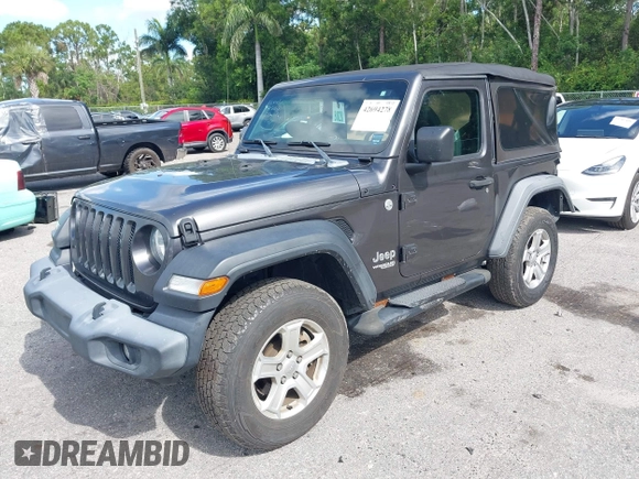 2018 Jeep Wrangler Sport with VIN 1C4GJXAG5JW138437, listed as a IAAI auction lot 42694278 with 58,258 mi miles and . Bid and sale history available at DreamBid. Image 2.
