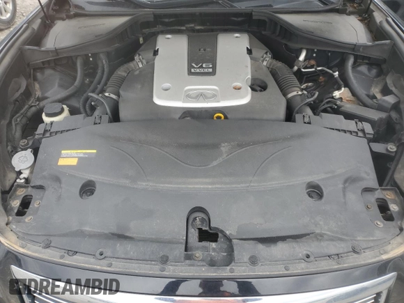 2013 Infiniti M z VIN JN1BY1AR5DM604133, wystawiony jako Copart lot #56890095 z przebiegiem 202 593 mil mil oraz Szkoda całkowita • Salvage title. Historia ofert i sprzedaży dostępna na DreamBid. Obrazek 11.