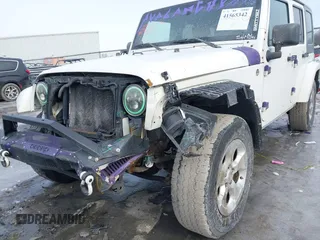 2010 Jeep Wrangler Unlimited Sahara with VIN 1J4HA5H19AL177179, listed as a IAAI auction lot 41565342 with 181,392 mi miles. Bid and sale history available at carsss.com. Image 6.