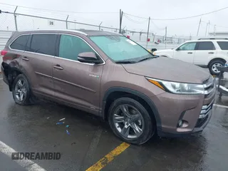 2018 Toyota Highlander Hybrid Limited with VIN 5TDDGRFH2JS039556, listed as a IAAI auction lot 41539754 with 71,924 mi miles and . Bid and sale history available at DreamBid. Image 1.