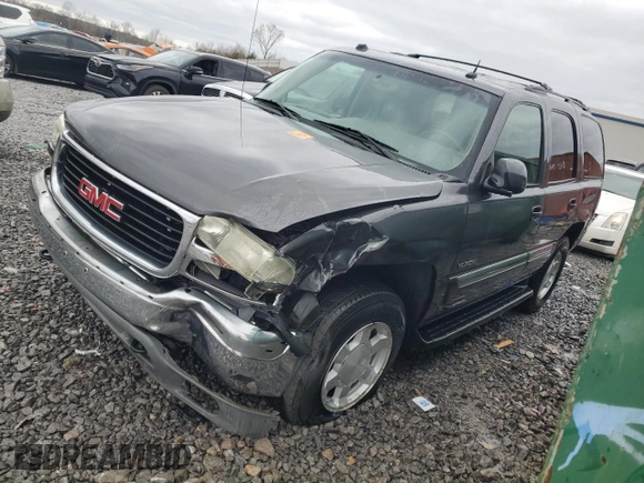 2005 GMC Yukon SLT z VIN 1GKEC13T35J119126, wystawiony jako Copart lot #47849455 z przebiegiem 301 785 mil mil oraz Szkoda całkowita • Salvage title. Historia ofert i sprzedaży dostępna na DreamBid. Obrazek 1.