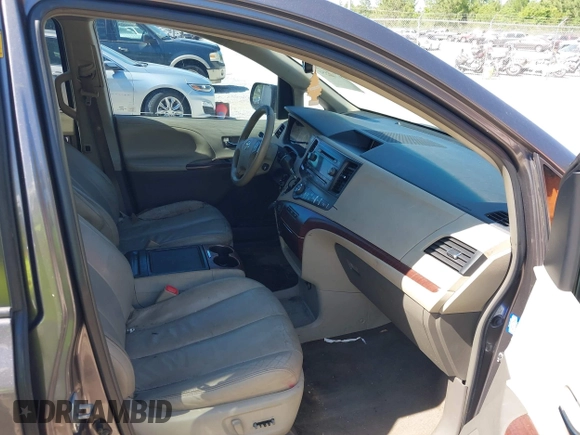 2012 Toyota Sienna XLE AAS with VIN 5TDYK3DC5CS259216, listed as a IAAI auction lot 42143551 with 219,957 mi miles and . Bid and sale history available at DreamBid. Image 5.