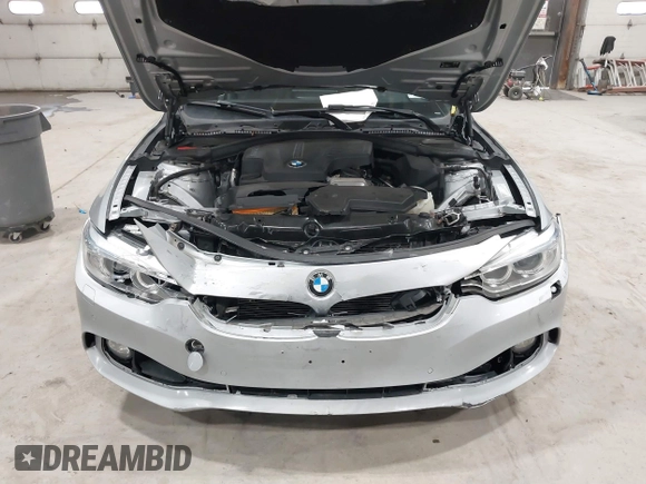 2016 BMW 4 Series 428i xDrive with VIN WBA4C9C5XGG138843, listed as a IAAI auction lot 41747358 with 63,804 mi miles and . Bid and sale history available at DreamBid. Image 6.