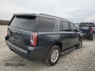 2020 GMC Yukon SLT with VIN 1GKS1BKC3LR259725, listed as a Copart auction lot 43036055 with 125,347 mi miles and Salvage Title. Bid and sale history available at DreamBid. Image 3.