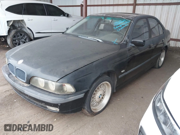1998 BMW 5 Series 528i z VIN WBADD6325WBW34033, wystawiony jako IAAI lot #41025167 z przebiegiem Nie podano mil oraz . Historia ofert i sprzedaży dostępna na DreamBid. Obrazek 2.