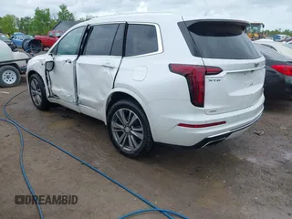 2021 Cadillac XT6 Premium Luxury z VIN 1GYKPDRS0MZ141453, wystawiony jako IAAI lot #42215954 z przebiegiem 144 245 mil mil oraz . Historia ofert i sprzedaży dostępna na DreamBid. Obrazek 3.