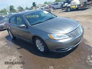 2012 Chrysler 200 Touring with VIN 1C3CCBBGXCN326023, listed as a IAAI auction lot 42126529 with 163,325 mi miles and . Bid and sale history available at carsss.com. Image 1.