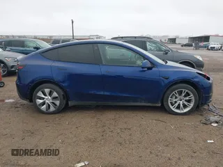 2023 Tesla Model Y Long Range with VIN 7SAYGDEE4PA064743, listed as a IAAI auction lot 41523760 with 41,113 mi miles. Bid and sale history available at carsss.com. Image 13.