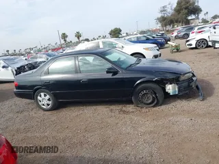 2001 Toyota Camry CE with VIN JT2BG22K910548345, listed as a IAAI auction lot 41723835 with 170,228 mi miles and . Bid and sale history available at DreamBid. Image 14.