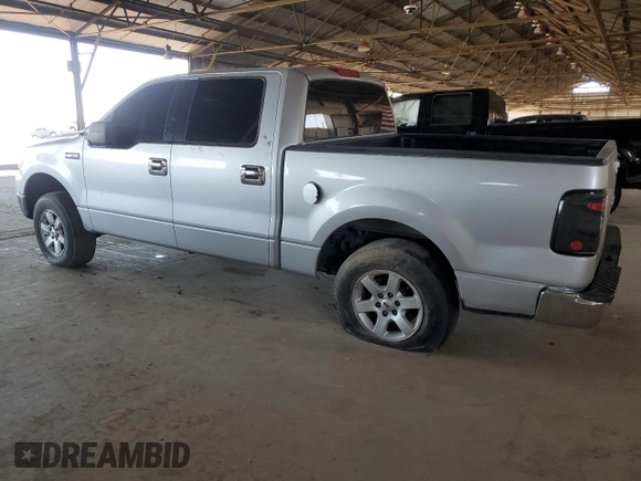 2005 Ford F-150 XLT with VIN 1FTPW12505KF07827, listed as a Copart auction lot 62026695 with Not provided miles and Salvage title. Bid and sale history available at DreamBid. Image 2.