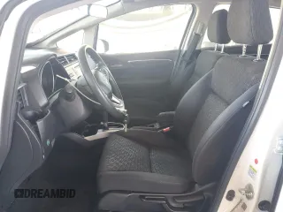 2016 Honda Fit LX with VIN JHMGK5H58GX031938, listed as a Copart auction lot 63101705 with 102,138 mi miles and Salvage title. Bid and sale history available at DreamBid. Image 7.