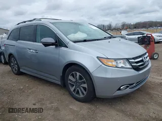 2016 Honda Odyssey Touring Elite with VIN 5FNRL5H99GB107896, listed as a IAAI auction lot 42040395 with 162,120 mi miles. Bid and sale history available at carsss.com. Image 1.