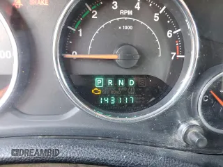 2012 Jeep Wrangler Unlimited Sport z VIN 1C4BJWDG0CL272440, wystawiony jako Copart lot #56044005 z przebiegiem 143 117 mil mil oraz Szkoda całkowita • Salvage title. Historia ofert i sprzedaży dostępna na DreamBid. Obrazek 9.