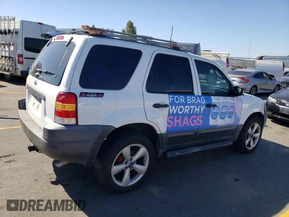 2004 Ford Escape XLS with VIN 1FMYU02184DA20455, listed as a Copart auction lot 73806544 with 322,565 mi miles and Clean Title. Bid and sale history available at DreamBid. Image 3.