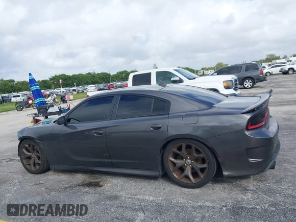 2019 Dodge Charger GT with VIN 2C3CDXHG6KH628451, listed as a IAAI auction lot 40750593 with 80,996 mi miles and . Bid and sale history available at DreamBid. Image 14.