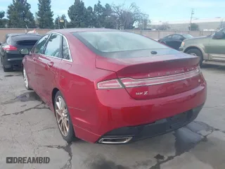 2014 Lincoln MKZ with VIN 3LN6L2GK0ER803608, listed as a IAAI auction lot 41712152 with 75,548 mi miles. Bid and sale history available at carsss.com. Image 3.