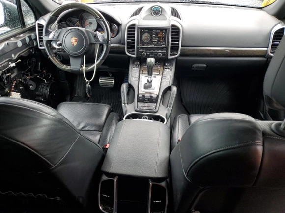 2011 Porsche Cayenne S with VIN WP1AB2A2XBLA55565, listed as a Copart auction lot 63094305 with 105,250 mi miles and Salvage title. Bid and sale history available at DreamBid. Image 8.