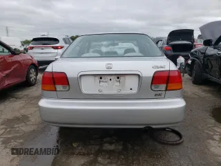 1997 Honda Civic EX with VIN 1HGEJ8647VL018949, listed as a Copart auction lot 72557904 with 162,531 mi miles and Salvage Title. Bid and sale history available at carsss.com. Image 6.