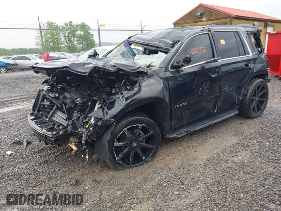 2018 Chevrolet Tahoe LT with VIN 1GNSCBKC2JR359681, listed as a IAAI auction lot 42287525 with 144,568 mi miles and . Bid and sale history available at DreamBid. Image 2.