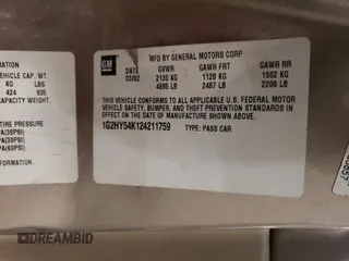 2002 Pontiac Bonneville SLE z VIN 1G2HY54K124211759, wystawiony jako Copart lot #54573555 z przebiegiem 106 409 mil mil oraz Szkoda całkowita • Salvage title. Historia ofert i sprzedaży dostępna na DreamBid. Obrazek 12.