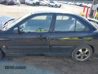 2006 Nissan Sentra SE-R Spec V z VIN 3N1AB51D46L495721, wystawiony jako IAAI lot #41886006 z przebiegiem 201 712 mil mil oraz . Historia ofert i sprzedaży dostępna na DreamBid. Obrazek 14.