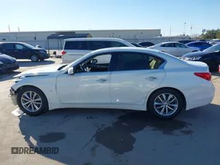 2014 Infiniti Q50 z VIN JN1BV7AP2EM681053, wystawiony jako IAAI lot #41395566 z przebiegiem 230 055 mil mil oraz . Historia ofert i sprzedaży dostępna na DreamBid. Obrazek 15.