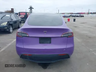 2021 Tesla Model Y Long Range with VIN 5YJYGDEE7MF224531, listed as a IAAI auction lot 38454442 with 52,408 mi miles. Bid and sale history available at carsss.com. Image 17.