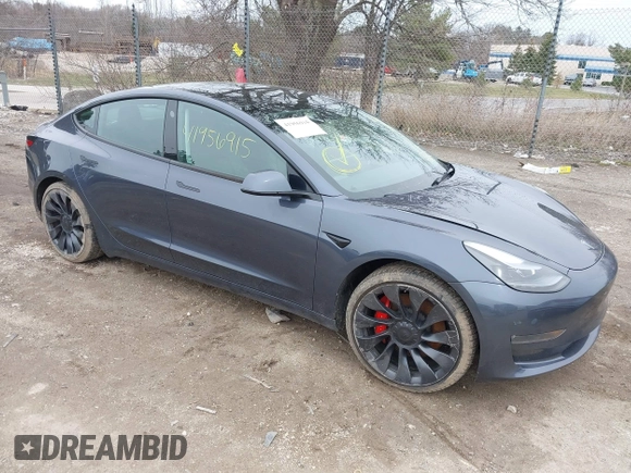 2023 Tesla Model 3 Performance with VIN 5YJ3E1EC9PF407365, listed as a IAAI auction lot 41956915 with 31,087 mi miles. Bid and sale history available at carsss.com. Image 1.