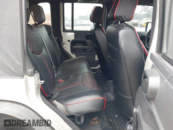 2007 Jeep Wrangler Unlimited X with VIN 1J4GA391X7L107424, listed as a IAAI auction lot 41752013 with 196,557 mi miles and . Bid and sale history available at DreamBid. Image 8.