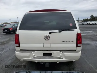 2003 Cadillac Escalade z VIN 1GYEC63T93R208877, wystawiony jako Copart lot #83894424 z przebiegiem 160 530 mil mil oraz Szkoda całkowita • Salvage title. Historia ofert i sprzedaży dostępna na DreamBid. Obrazek 6.