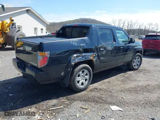 2007 Honda Ridgeline RTL w/Leather with VIN 2HJYK165X7H548322, listed as a IAAI auction lot 41983105 with 152,292 mi miles. Bid and sale history available at carsss.com. Image 4.