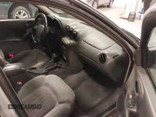 2004 Pontiac Grand Am GT with VIN 1G2NW52E04M617802, listed as a IAAI auction lot 41353209 with 103,716 mi miles. Bid and sale history available at carsss.com. Image 5.