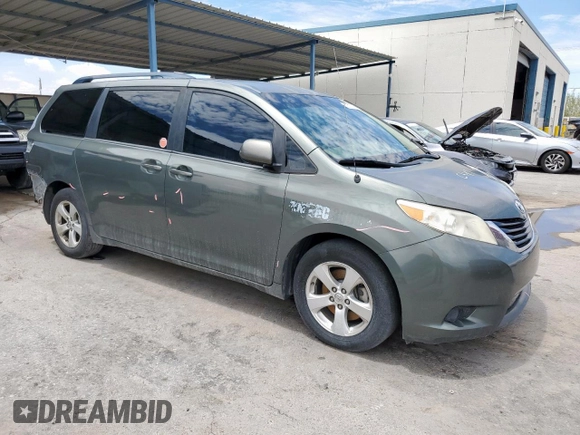2014 Toyota Sienna LE AAS with VIN 5TDKK3DC4ES486440, listed as a Copart auction lot 62010355 with 401,453 mi miles and Salvage title. Bid and sale history available at DreamBid. Image 4.