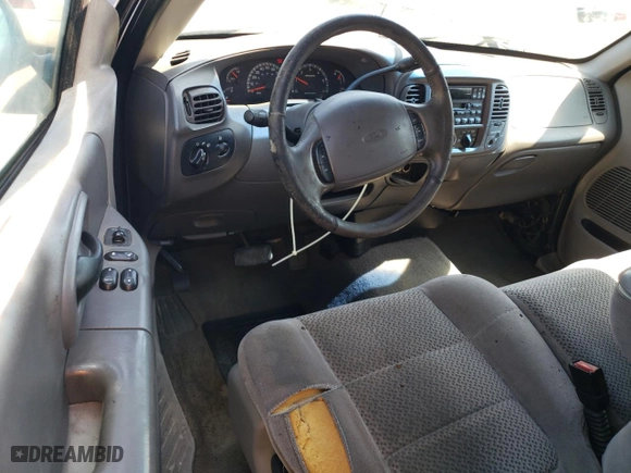 2002 Ford F-150 XL with VIN 1FTRX07252KC90074, listed as a Copart auction lot 48565215 with 0 mi miles and Salvage Title. Bid and sale history available at carsss.com. Image 8.