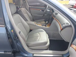 2003 Mercedes-Benz E-Class 3.2L with VIN WDBUF65J43A232053, listed as a IAAI auction lot 41930685 with 74,675 mi miles. Bid and sale history available at carsss.com. Image 5.