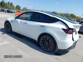 2022 Tesla Model Y Performance z VIN 7SAYGDEF2NF347456, wystawiony jako IAAI lot #42177725 z przebiegiem 29 374 mil mil oraz . Historia ofert i sprzedaży dostępna na DreamBid. Obrazek 3.