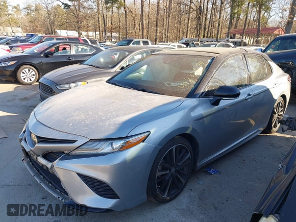 2019 Toyota Camry XSE with VIN 4T1B61HK6KU221824, listed as a IAAI auction lot 41289674 with 118,827 mi miles. Bid and sale history available at carsss.com. Image 2.