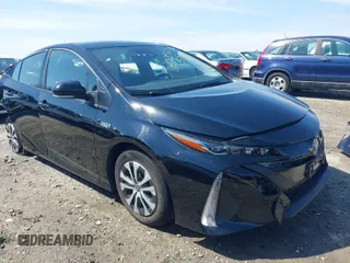 2021 Toyota Prius LE with VIN JTDKAMFP8M3164750, listed as a IAAI auction lot 41823712 with 36,305 mi miles and . Bid and sale history available at DreamBid. Image 1.
