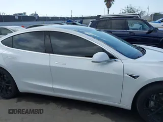 2020 Tesla Model 3 Long Range with VIN 5YJ3E1EB9LF795246, listed as a IAAI auction lot 41895750 with 163,061 mi miles and . Bid and sale history available at DreamBid. Image 14.